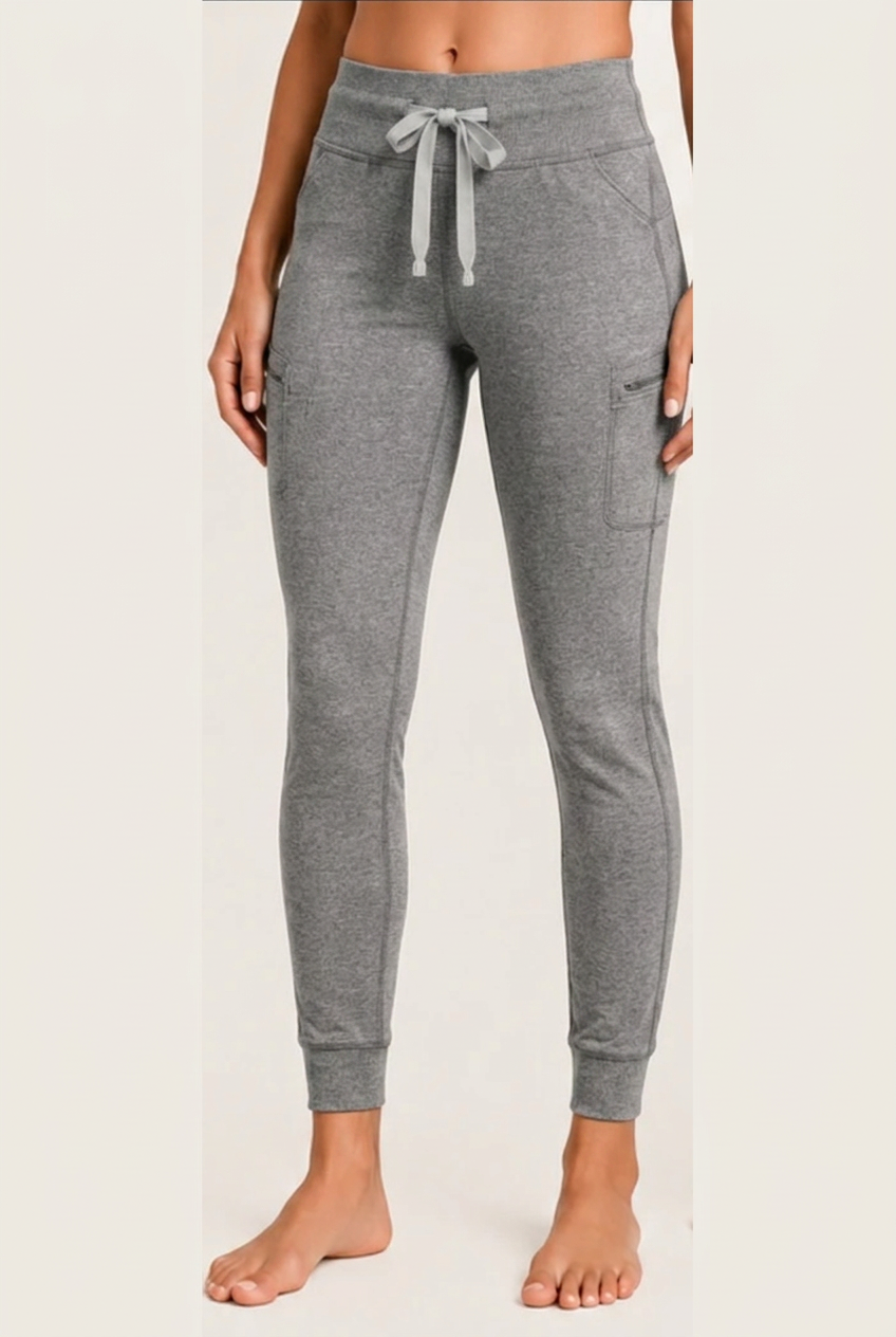 The Clover Legging in Grey — high yoga-style waistband, contrasting drawstring, zip thigh pocket and cuffed ankle